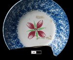 Floral painted and sponged saucer, impressed "Harry".